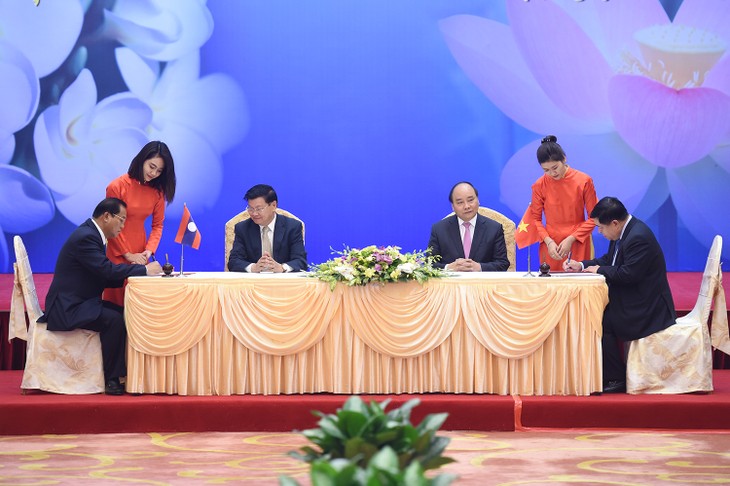 Laotische Presse schätzt Erfolge der 39. Sitzung der Regierungskommission Vietnams und Laos  - ảnh 1